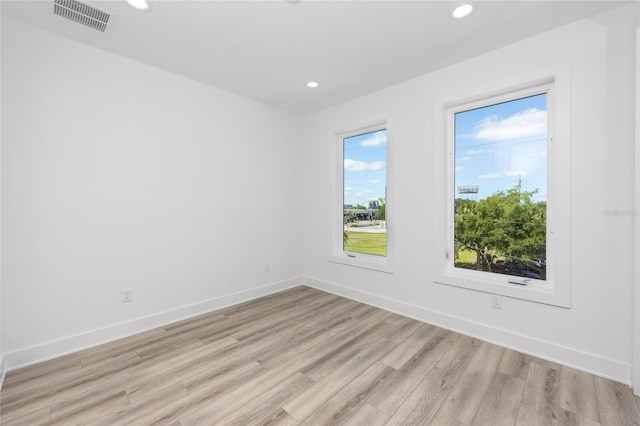 empty room with light wood-type flooring