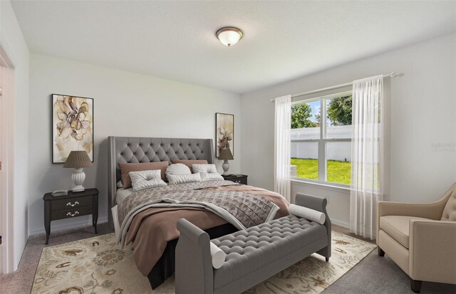 bedroom with light colored carpet