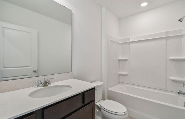 full bathroom with toilet, vanity, and bathtub / shower combination