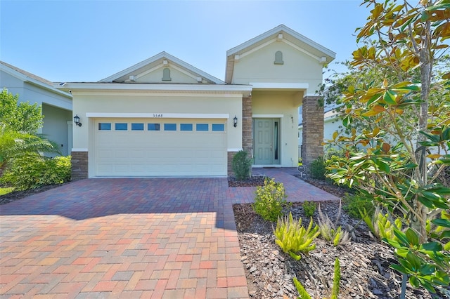 view of front of property featuring a garage