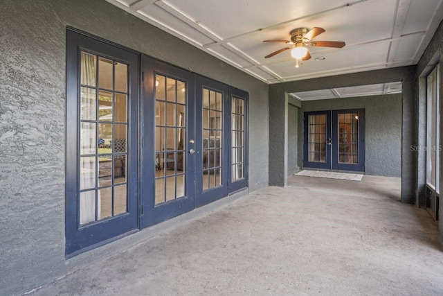 view of patio featuring french doors and ceiling fan