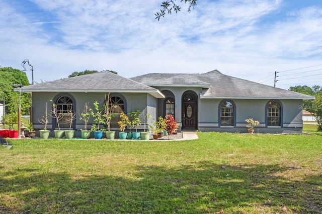 ranch-style house with a front yard