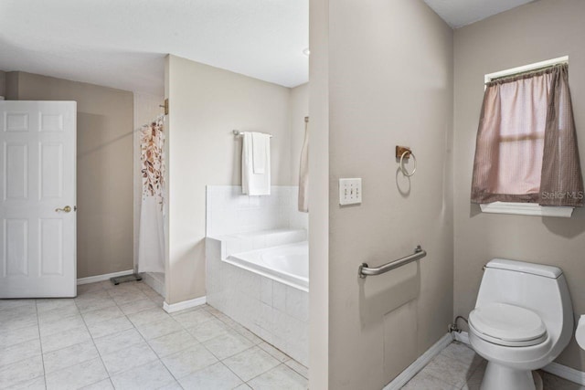 bathroom featuring tile patterned floors, separate shower and tub, and toilet