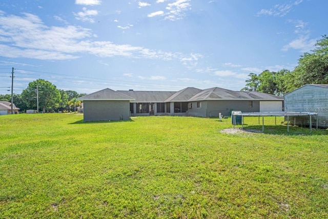 view of yard featuring a trampoline