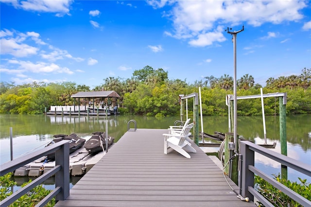 dock area featuring a water view