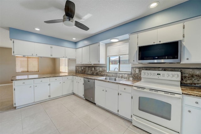 kitchen featuring white cabinets, sink, and stainless steel appliances