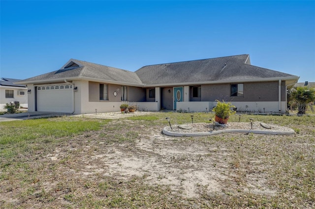 single story home with a garage