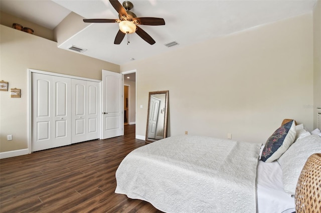 bedroom featuring a closet, ceiling fan, and dark wood-type flooring