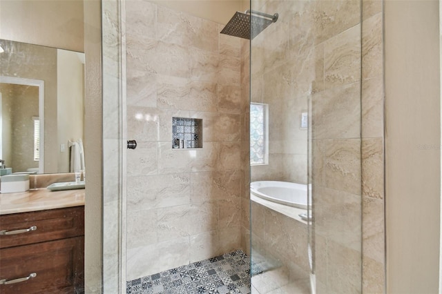 bathroom with oversized vanity and independent shower and bath