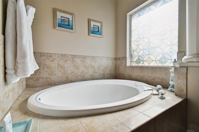 bathroom with tiled bath