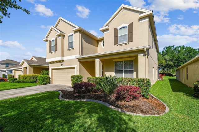 view of front of home with a front lawn and a garage