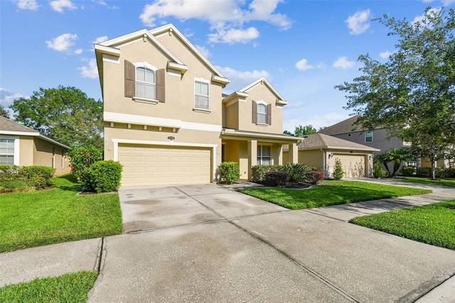 view of front of home featuring a front lawn and a garage