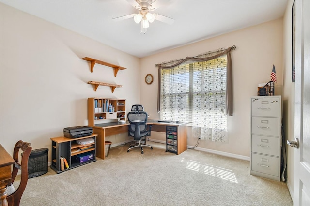 office featuring ceiling fan and light colored carpet