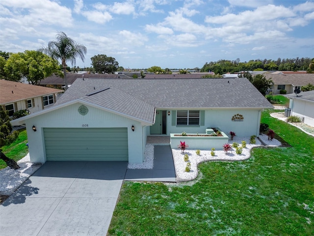 ranch-style house featuring a front lawn, concrete driveway, a garage, and a shingled roof