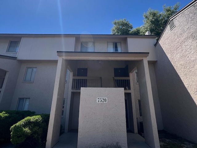 exterior space featuring a balcony