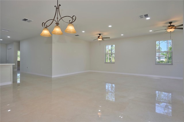 unfurnished room with ceiling fan and light tile floors