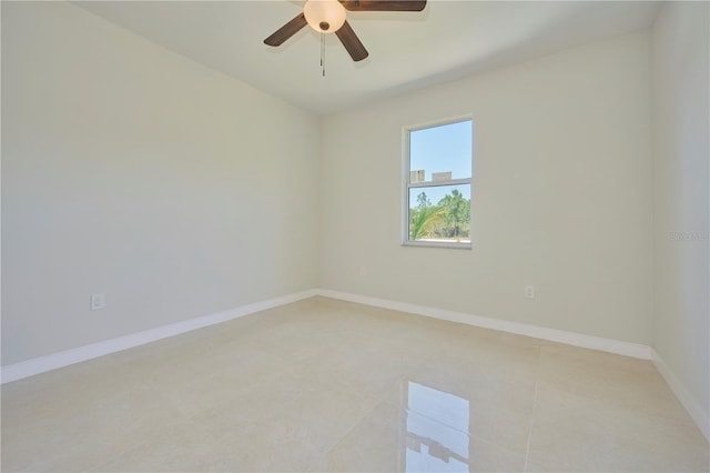 spare room with ceiling fan