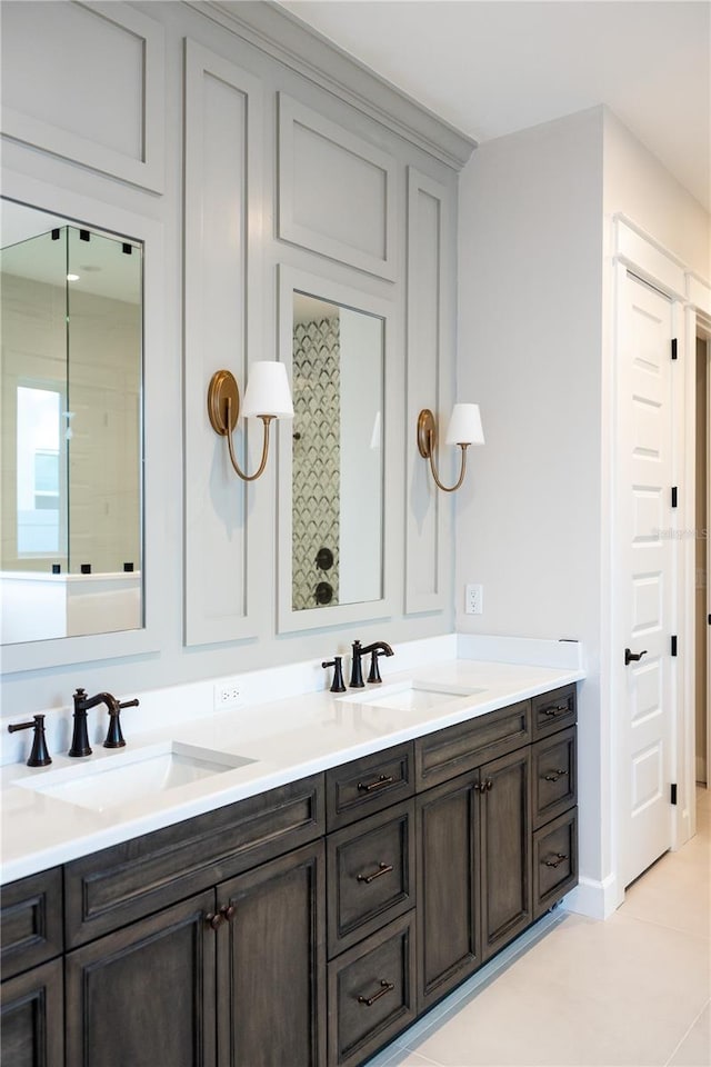 bathroom featuring vanity and tile patterned flooring