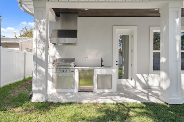 view of patio featuring area for grilling and an outdoor kitchen