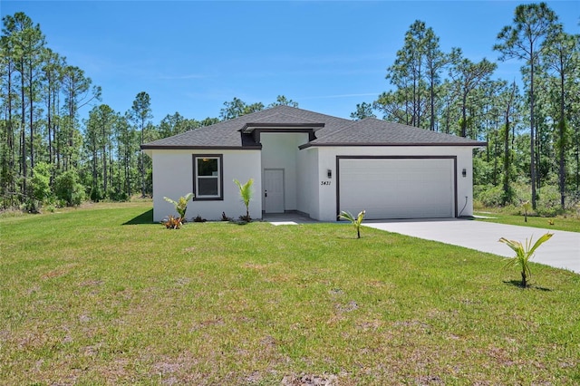 view of front facade featuring a front lawn and a garage