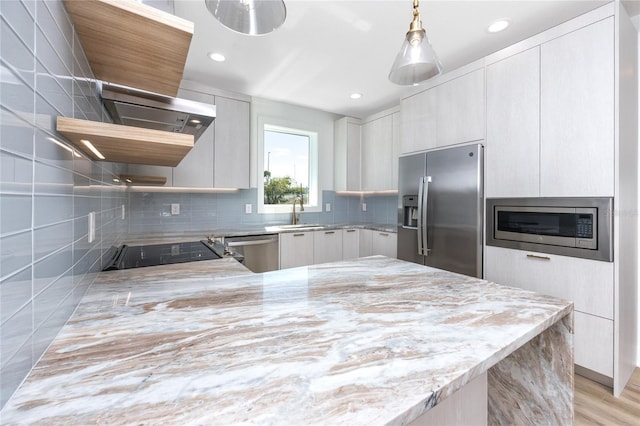 1308 E Columbus Dr Unit 2, Tampa, FL 33605 - kitchen with stainless steel appliances, open shelves, modern cabinets, light stone counters, and recessed lighting