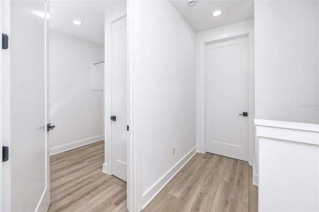 1308 E Columbus Dr Unit 2, Tampa, FL 33605 - hall with light wood finished floors, baseboards, and recessed lighting