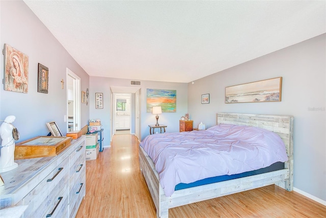 bedroom featuring light wood-type flooring