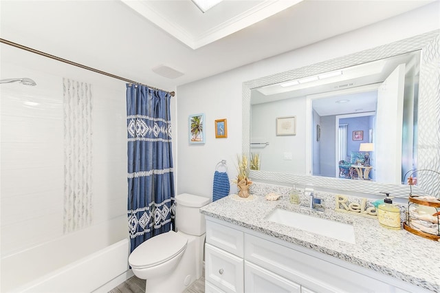 full bathroom with ornamental molding, shower / tub combo, vanity with extensive cabinet space, and toilet