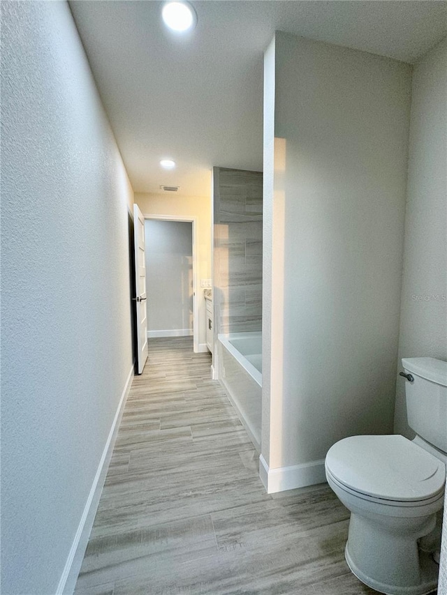 bathroom featuring toilet