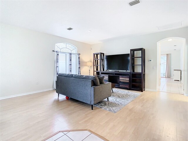 living room with light hardwood / wood-style floors