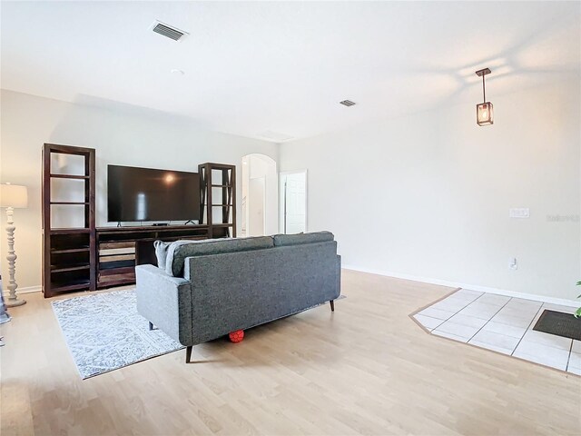 living room with light hardwood / wood-style floors