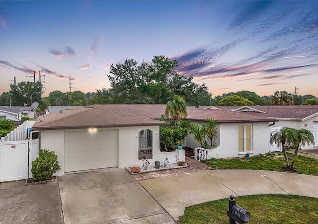 ranch-style home with a garage