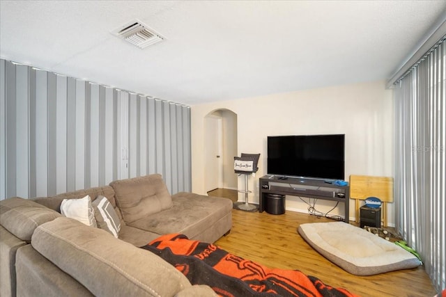 living room with light hardwood / wood-style floors