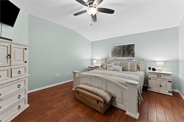 bedroom featuring vaulted ceiling, ceiling fan, and dark hardwood / wood-style floors