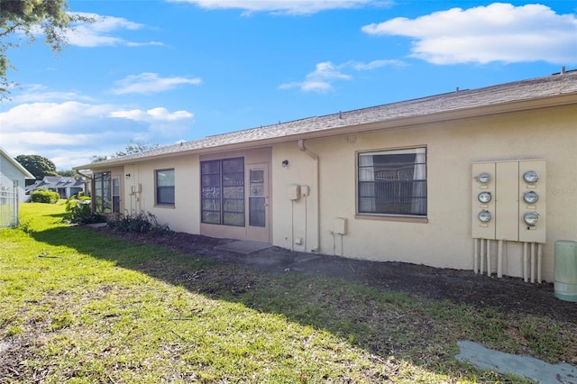 exterior space featuring a front lawn