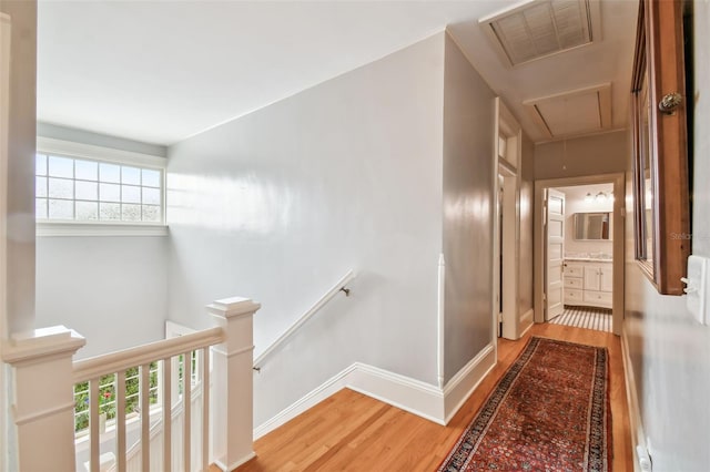 hall featuring light hardwood / wood-style flooring