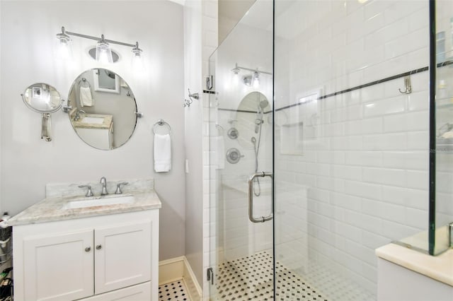 bathroom featuring vanity and walk in shower