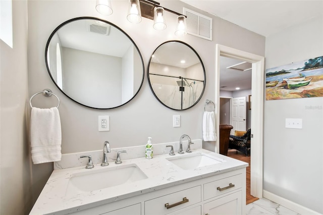 bathroom with vanity and curtained shower