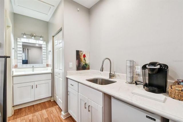 bathroom with vanity and hardwood / wood-style floors