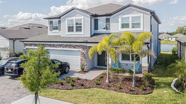 12964 Willow Grove Dr, Riverview, FL 33579 - view of front of home with a garage and a front lawn