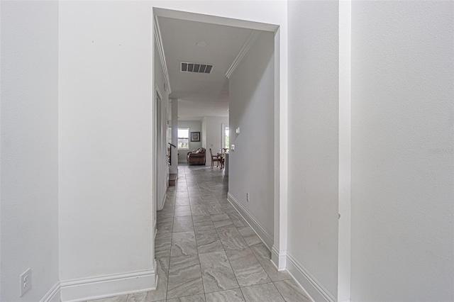 hallway with crown molding