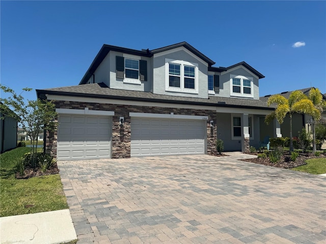 view of front of home with a garage