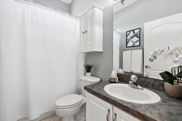 bathroom with oversized vanity and toilet