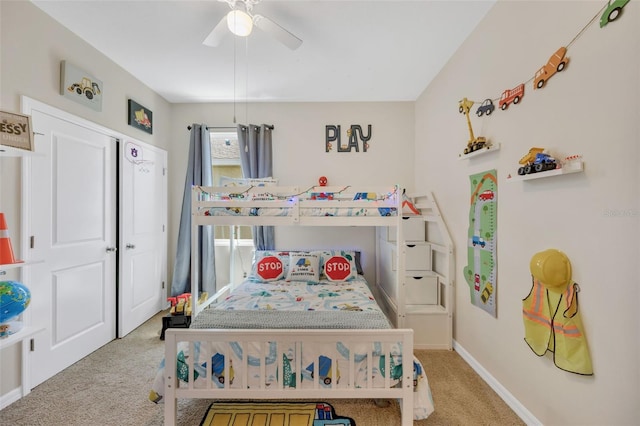 carpeted bedroom with ceiling fan