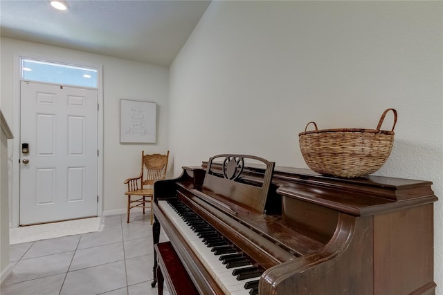 foyer entrance featuring light tile patterned flooring