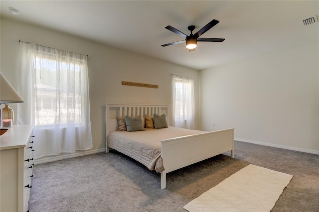 bedroom featuring ceiling fan and carpet floors