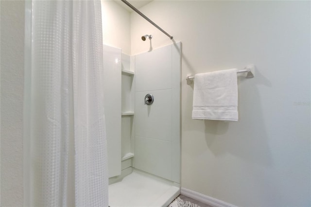 bathroom featuring walk in shower