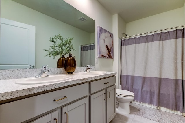 full bathroom featuring toilet, shower / tub combo with curtain, tile patterned flooring, and vanity