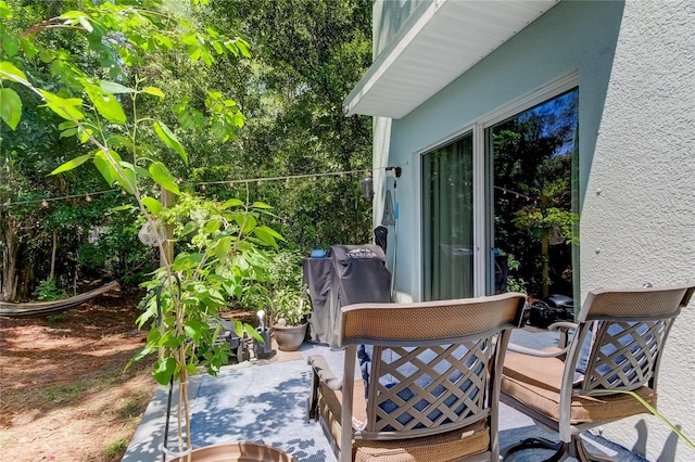 view of patio with a grill