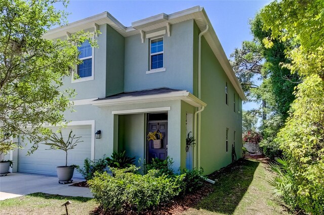 view of front of home with a garage